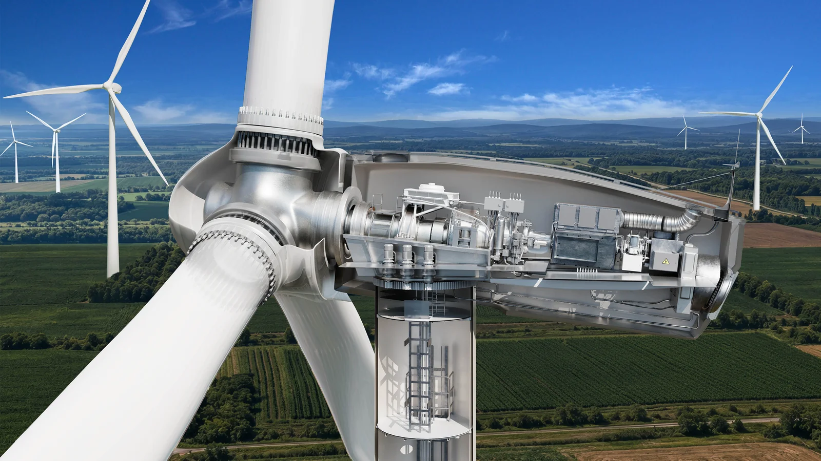 Wind turbine nacelle cutaway showing the reconstructed drivetrain above a wind farm.